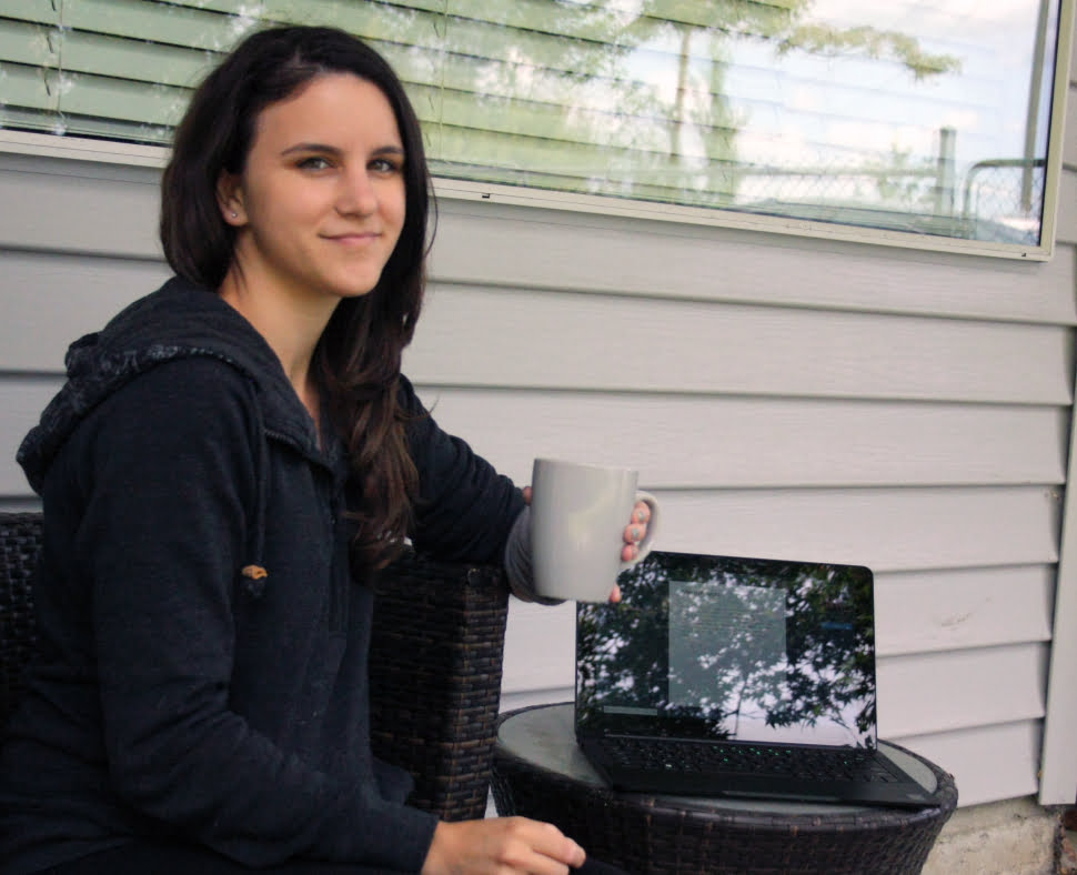 Carleen Geisler Holding A Coffee Mug In Left Hand